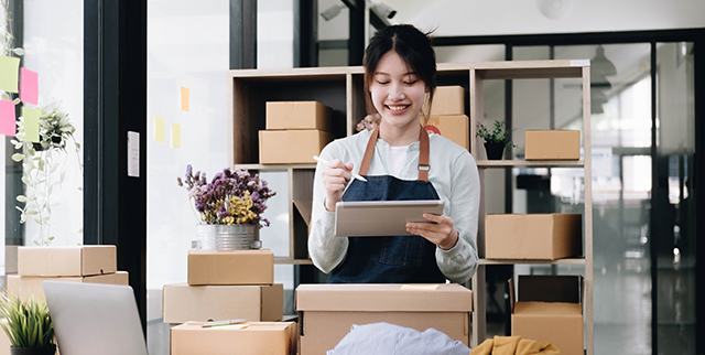 Woman checking her inventory for her business