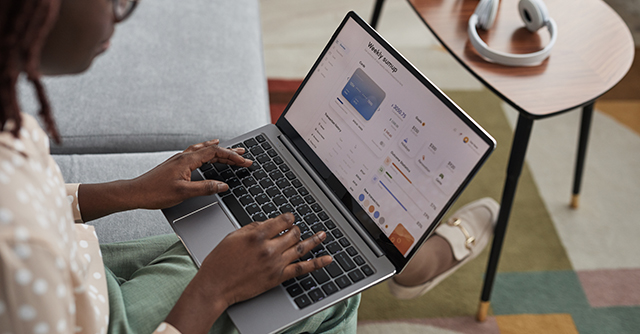 Woman on laptop doing online banking
