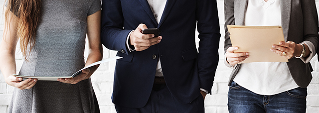 resources - people holding papers and a mobile phone